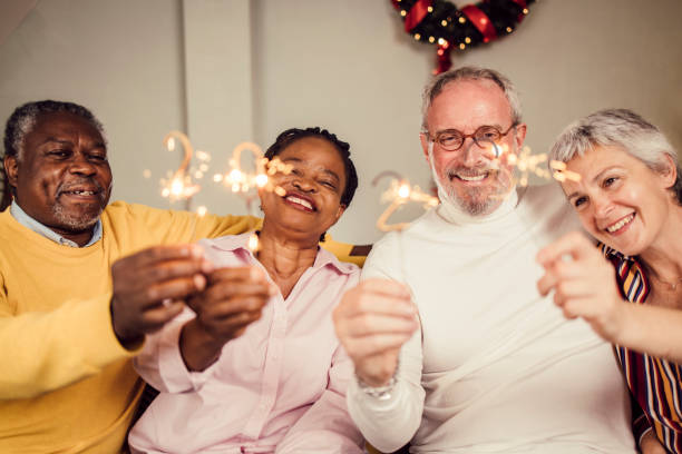 A senior adult smiling and looking forward to a new year